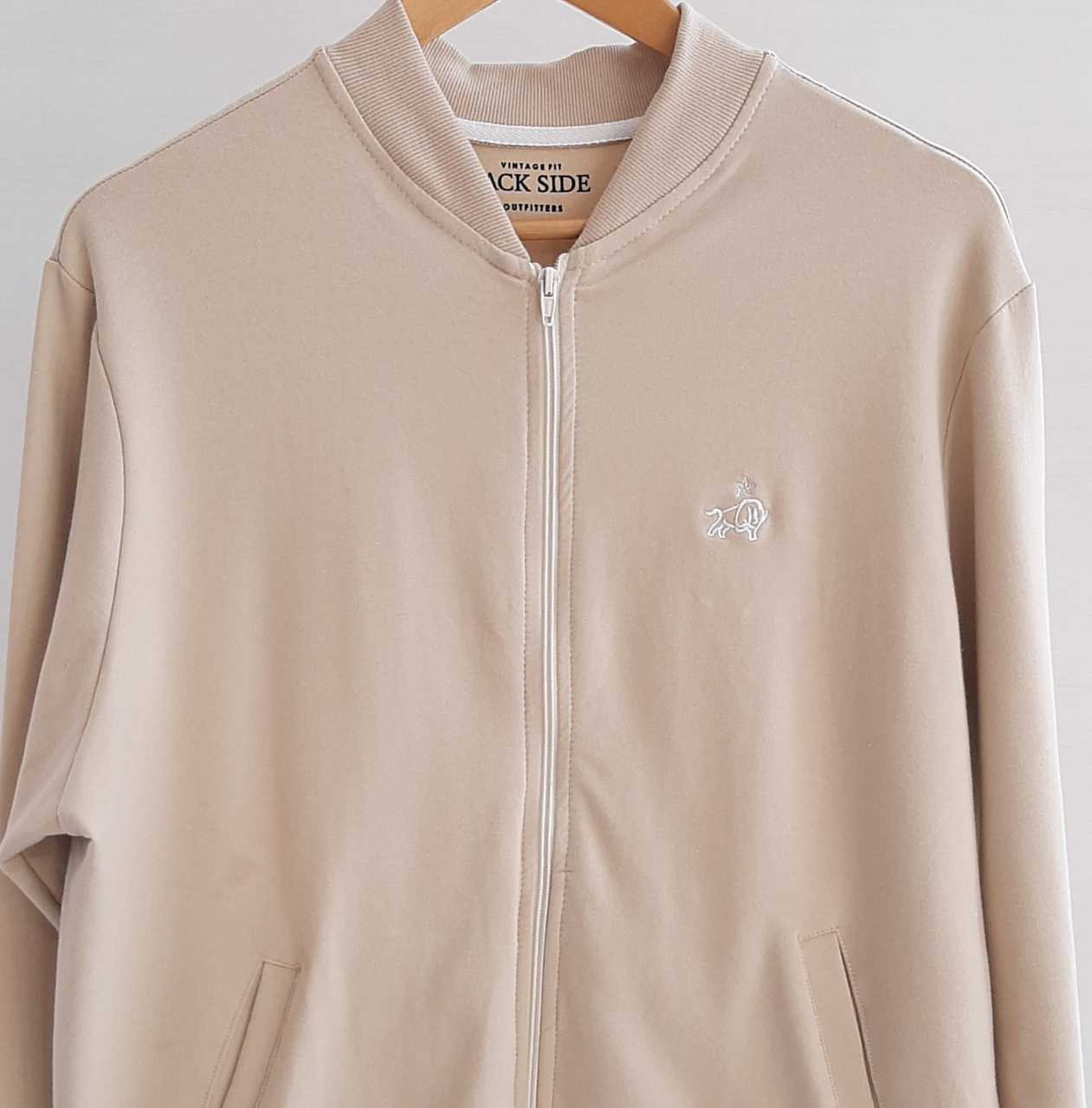 Canguro botones Jack Side, color crema